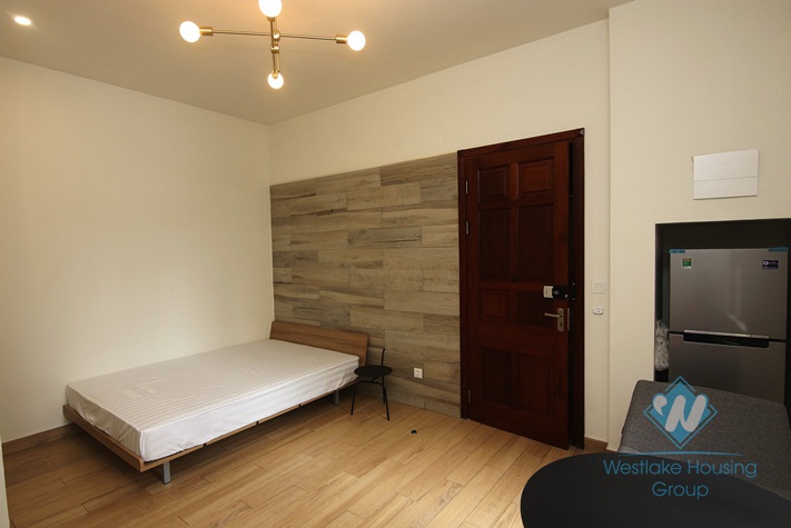 Clean and bright 1 bedroom apartment with simple design for rent in Doi Can Street, Ba Dinh District